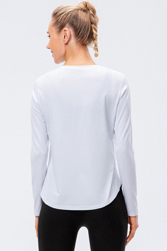 
            
                Load image into Gallery viewer, Curved Hem Long Sleeve Athletic Top
            
        