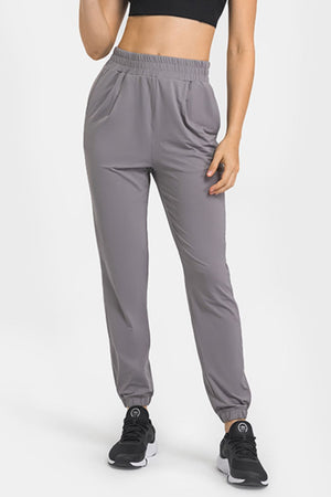 
            
                Load image into Gallery viewer, Elastic Waist Yoga Joggers with Pockets
            
        