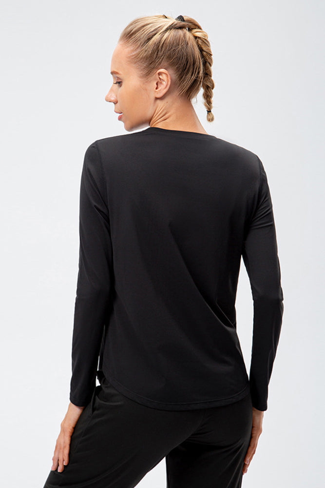 
            
                Load image into Gallery viewer, Curved Hem Long Sleeve Athletic Top
            
        